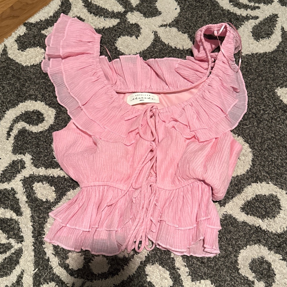 Pink ruffle top